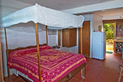 Beach level studio apartment bedroom and kitchen